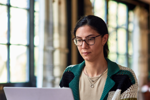Woman looking at a laptop